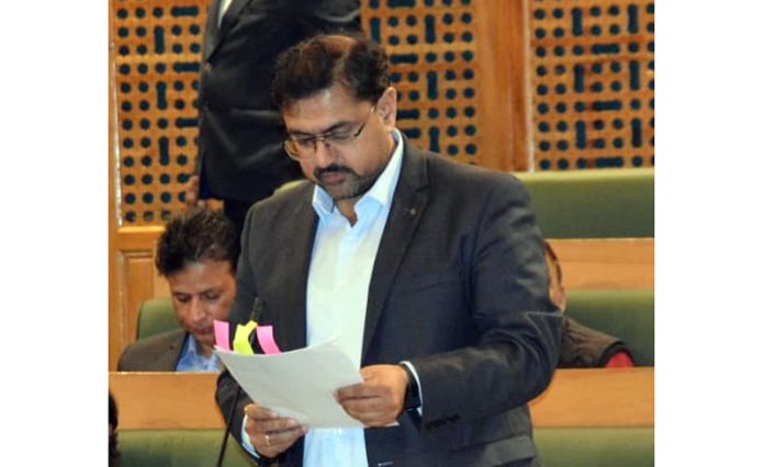 Minister Satish Sharma addressing the Legislative House on food supply