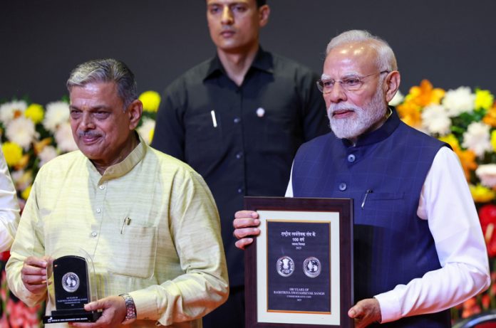 PM Modi releases commemorative coin and stamp for RSS centenary