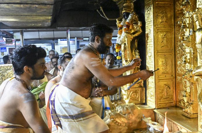 Devotees in traditional attire at Sabarimala Temple