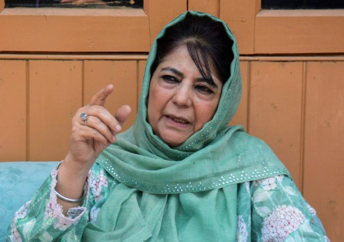 PDP President Mehbooba Mufti addressing the media in Srinagar.