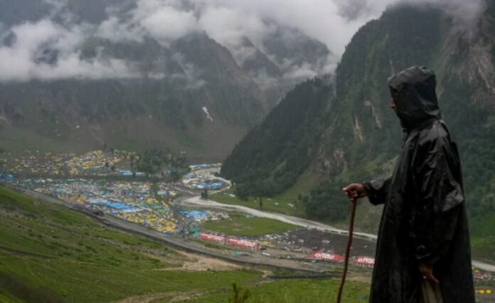 Pilgrims at Amarnath cave shrine under adverse weather
