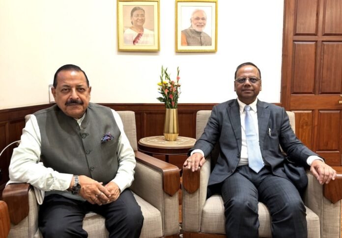 Justice Ranjit Vasantrao More with Dr. Jitendra Singh discussing tribunal reforms